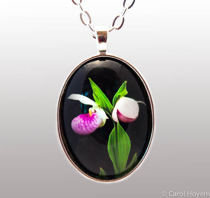 two showy lady slippers photo set in silver pendant